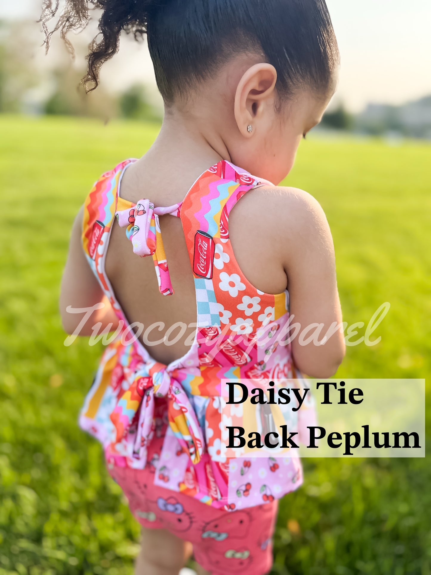 Daisy Tie Back Peplum